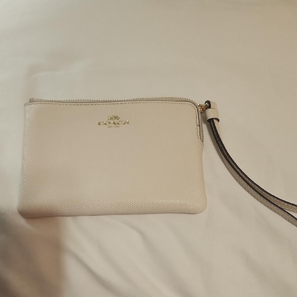Coach White Clutch Elegant and Versatile